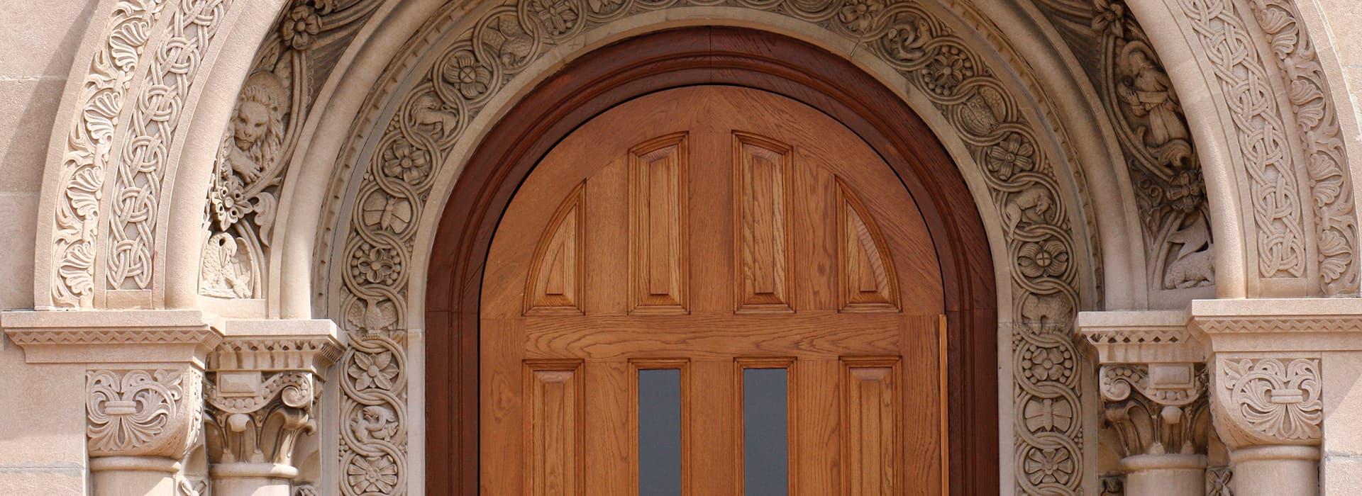 Wooden front door of campus building